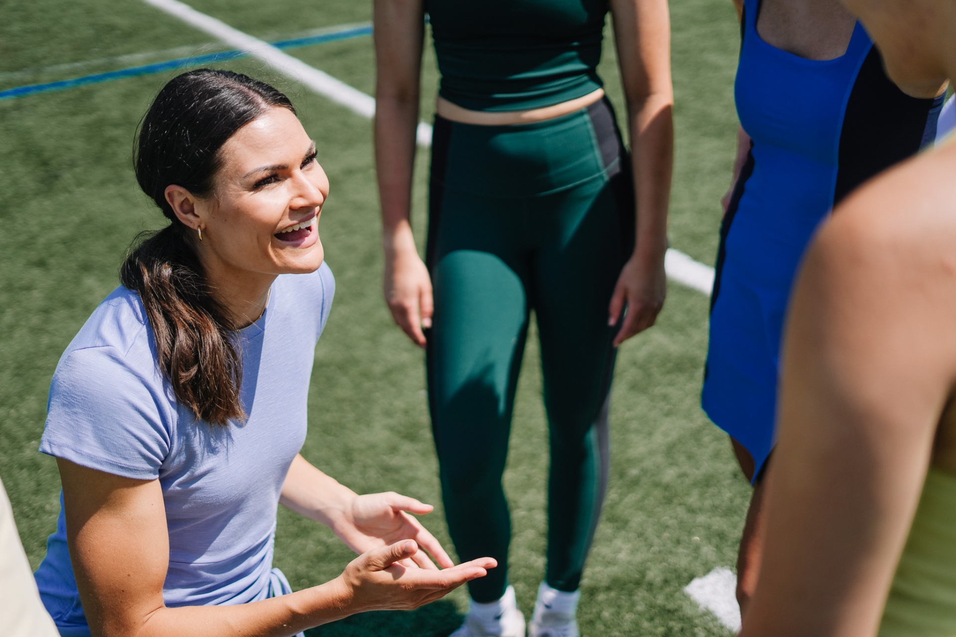 Coach with athletes